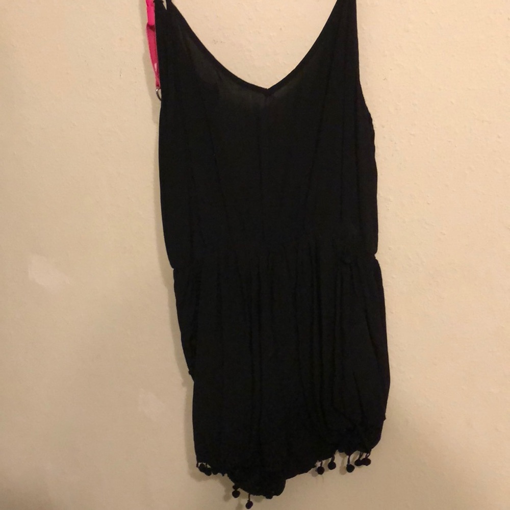 Medium romper.. very soft and comfortable zips up